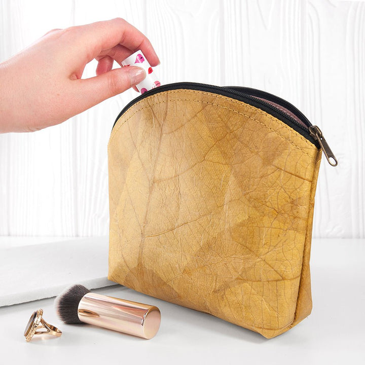 Buy Leaf Leather Curved Zip Cosmetic Bag available now at www.giftsfinder.co.uk