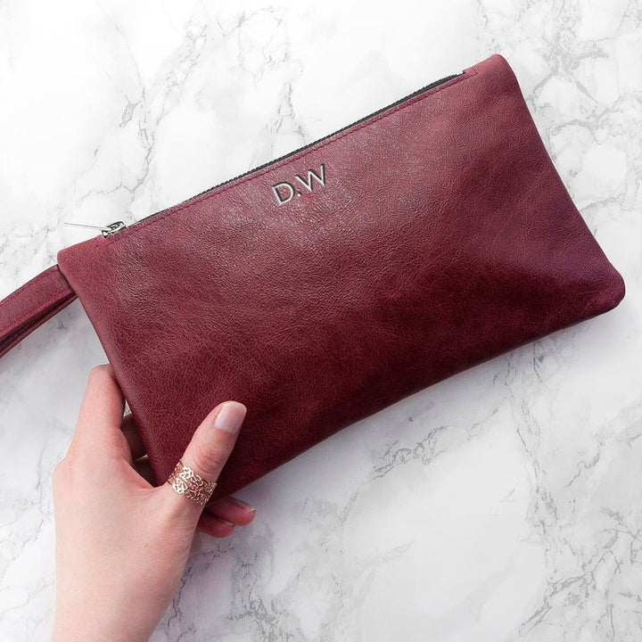 Buy Monogrammed Burgundy Leather Clutch Bag at www.giftsfinder.co.uk