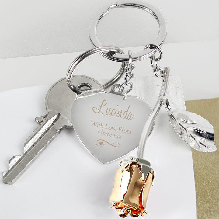 Buy Personalised Silver Plated Swirls & Hearts Rose Gold Rose Keyring at www.giftsfinder.co.uk