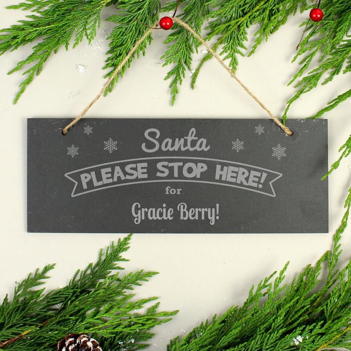 Personalised Santa Please Stop Here... Hanging Slate Plaque in gift category Personalised Christmas Decorations