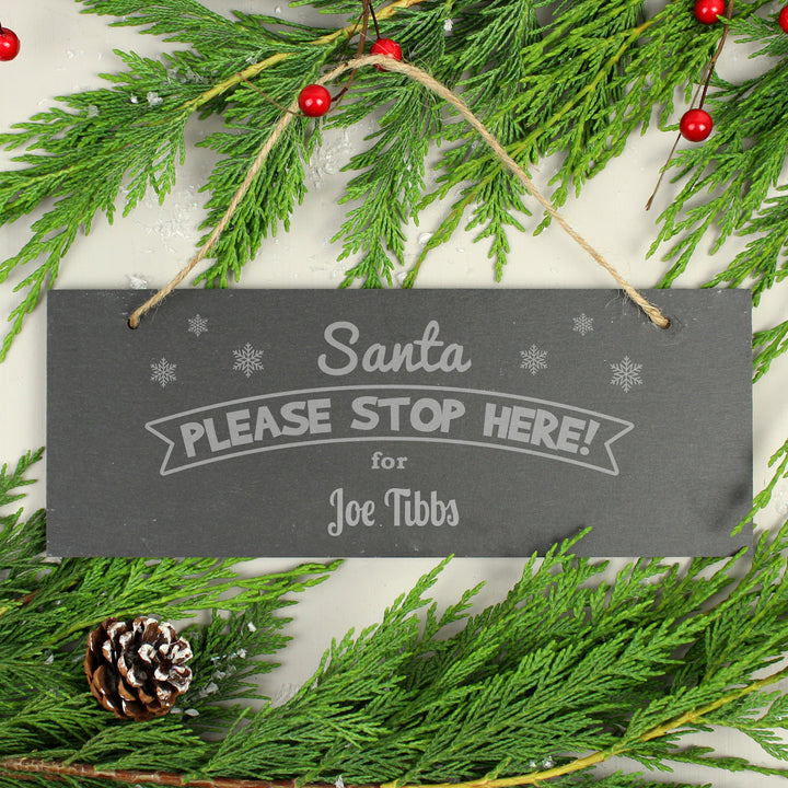 Personalised Santa Please Stop Here... Hanging Slate Plaque in gift category Personalised Christmas Decorations