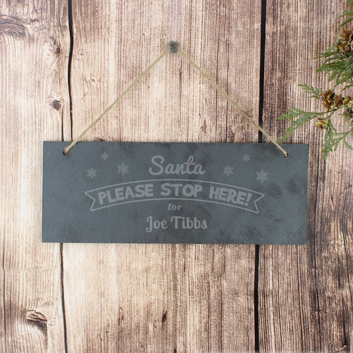 Personalised Santa Please Stop Here... Hanging Slate Plaque in gift category Personalised Christmas Decorations