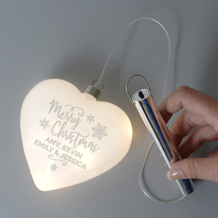 Buy Personalised Merry Christmas LED Hanging Glass Heart at www.giftsfinder.co.uk