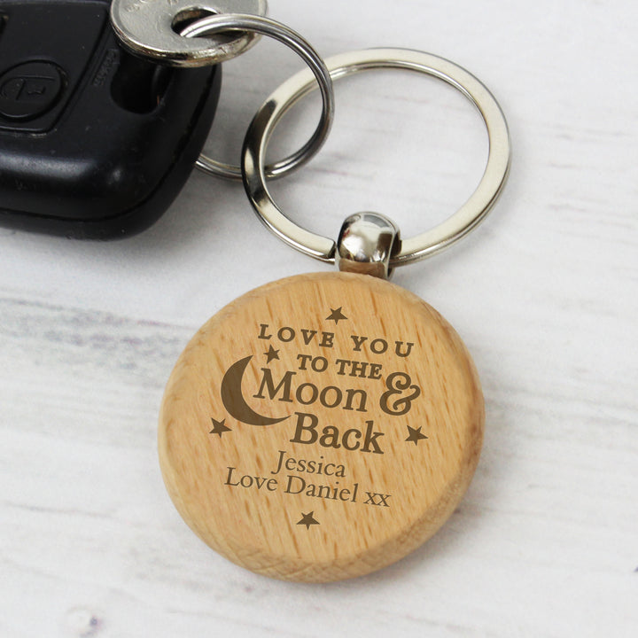 Buy Personalised Moon & Back Wooden Keyring at www.giftsfinder.co.uk