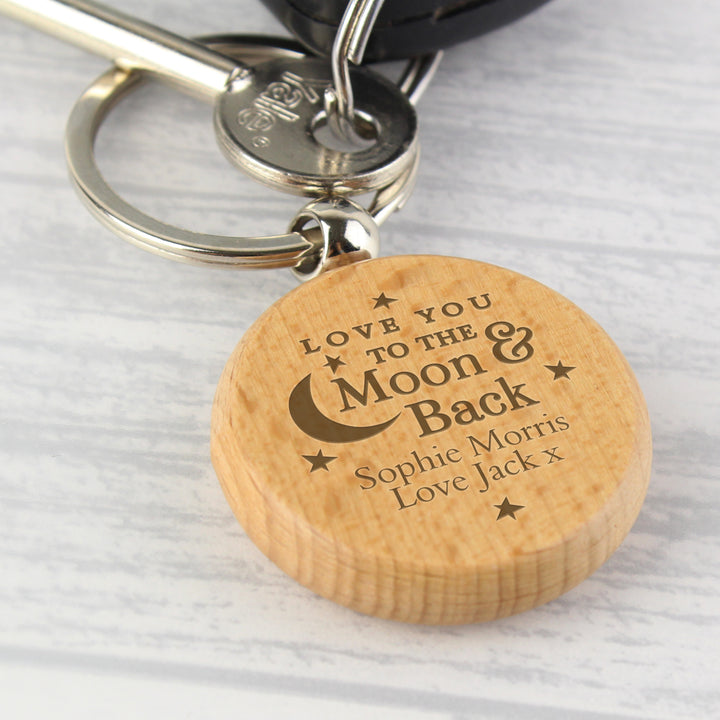 Buy Personalised Moon & Back Wooden Keyring at www.giftsfinder.co.uk