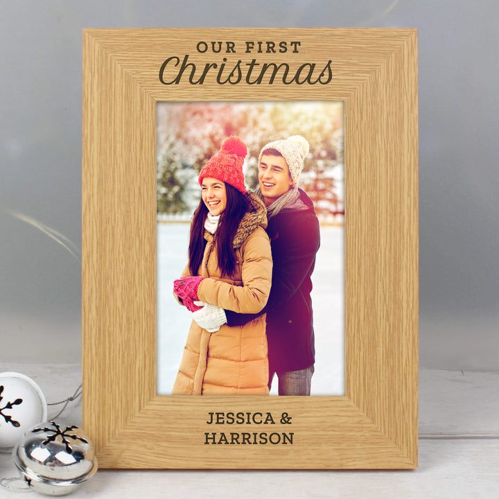 Buy Personalised 'Our First Christmas' 4x6 Oak Finish Photo Frame at www.giftsfinder.co.uk