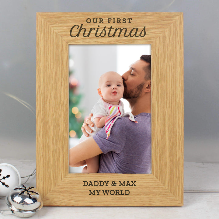 Buy Personalised 'Our First Christmas' 4x6 Oak Finish Photo Frame at www.giftsfinder.co.uk