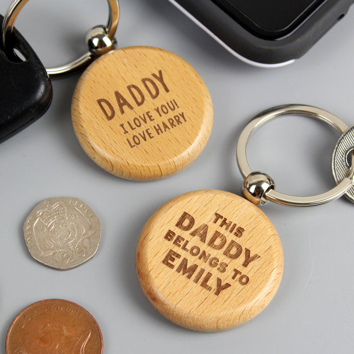 Buy Personalised This Daddy Belongs To Wooden Keyring at www.giftsfinder.co.uk