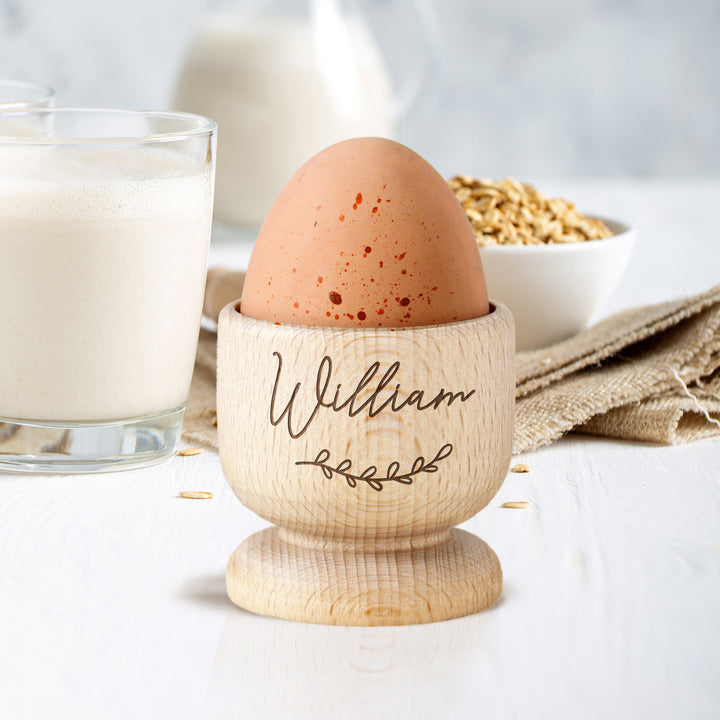 Buy Personalised Name Wooden Egg Cup at www.giftsfinder.co.uk