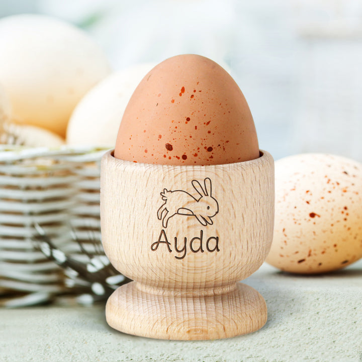 Buy Personalised Bunny Wooden Egg Cup available now at www.giftsfinder.co.uk