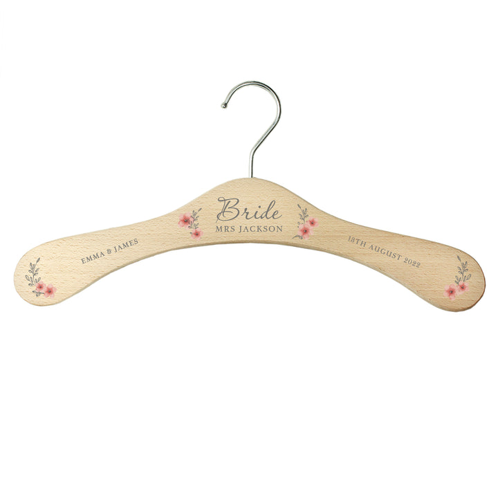 Buy Personalised Pink Floral Wooden Hanger at www.giftsfinder.co.uk