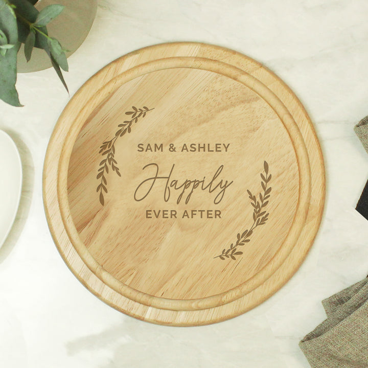 Buy Personalised Laurel Round Wooden Chopping Board available now at www.giftsfinder.co.uk