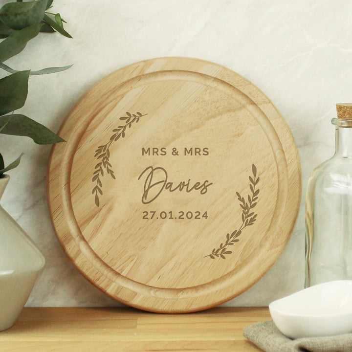 Buy Personalised Laurel Round Wooden Chopping Board available now at www.giftsfinder.co.uk