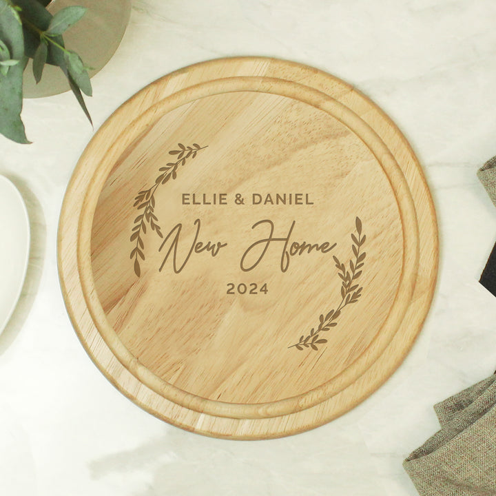 Buy Personalised Laurel Round Wooden Chopping Board available now at www.giftsfinder.co.uk