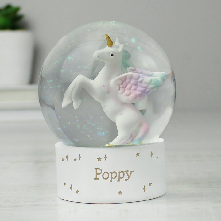 Buy Personalised Unicorn Name Snow Globe at www.giftsfinder.co.uk