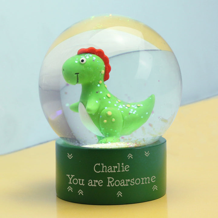 Buy Personalised Message Dinosaur Glitter Snow Globe available now at www.giftsfinder.co.uk