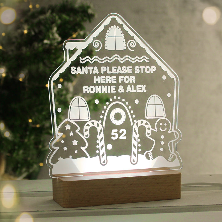 Buy Personalised Gingerbread House Christmas Wooden Based LED Light available now at www.giftsfinder.co.uk