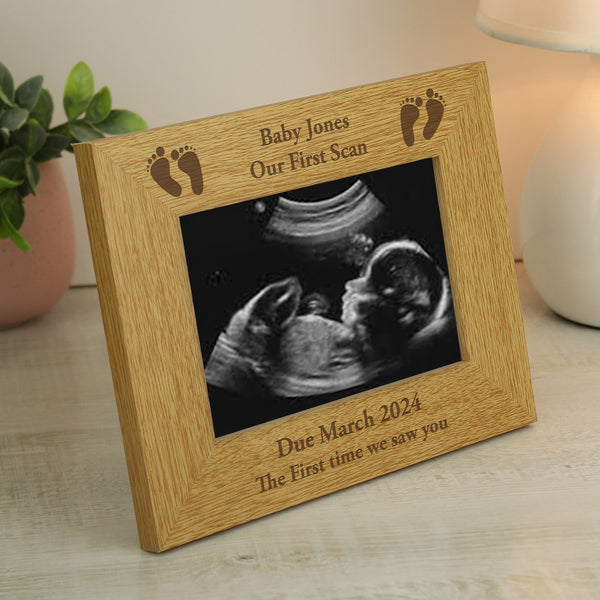 Buy Personalised Oak Finish 6x4 Landscape Baby Footprints Photo Frame at www.giftsfinder.co.uk