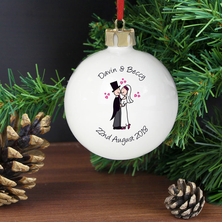 Buy Personalised Cartoon Couple Keepsake Bauble available now at www.giftsfinder.co.uk