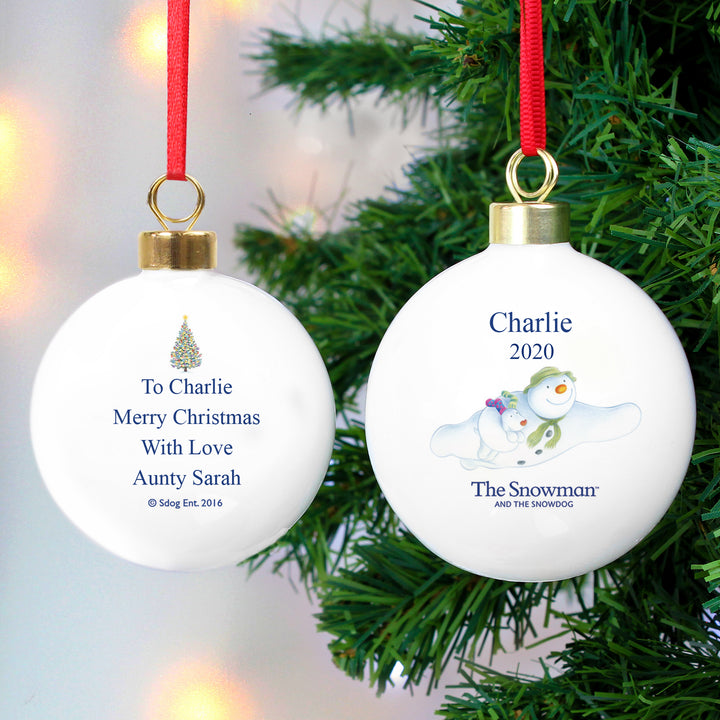 Buy Personalised The Snowman and the Snowdog Flying Bauble at www.giftsfinder.co.uk