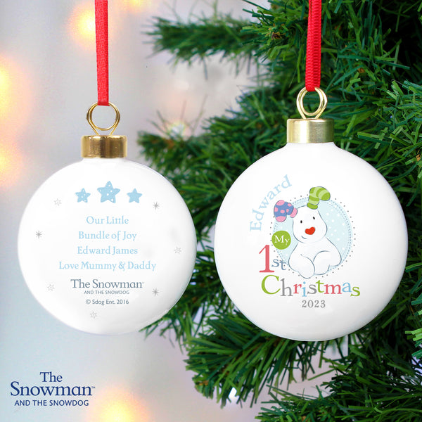 Buy Personalised The Snowman and the Snowdog My 1st Christmas Blue Bauble at www.giftsfinder.co.uk