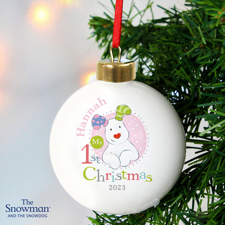 Buy Personalised The Snowman and the Snowdog My 1st Christmas Pink Bauble at www.giftsfinder.co.uk