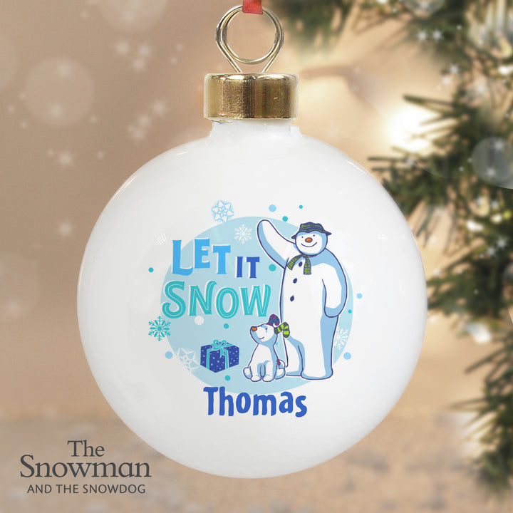 Buy Personalised The Snowman and the Snowdog Blue Bauble at www.giftsfinder.co.uk