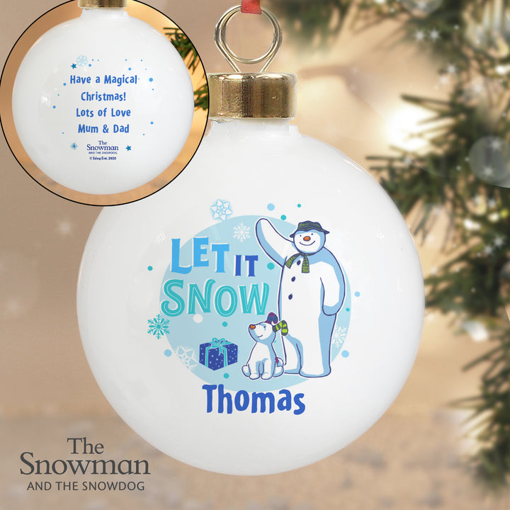 Buy Personalised The Snowman and the Snowdog Blue Bauble at www.giftsfinder.co.uk