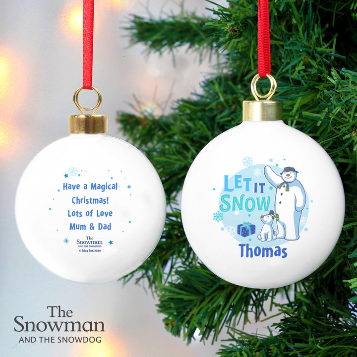 Buy Personalised The Snowman and the Snowdog Blue Bauble at www.giftsfinder.co.uk