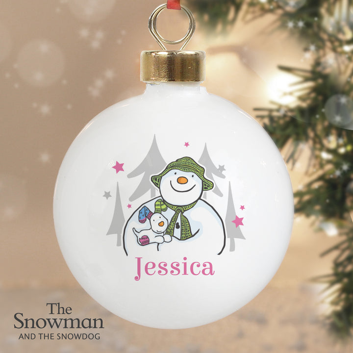 Buy Personalised The Snowman and the Snowdog Pink Bauble at www.giftsfinder.co.uk