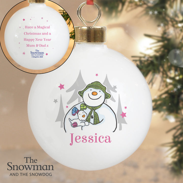 Buy Personalised The Snowman and the Snowdog Pink Bauble at www.giftsfinder.co.uk