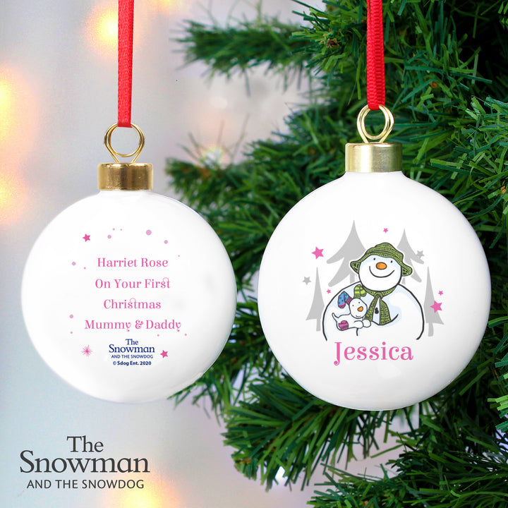 Buy Personalised The Snowman and the Snowdog Pink Bauble at www.giftsfinder.co.uk