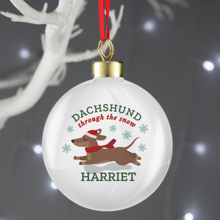 Buy Personalised 'Dachshund Through The Snow' Christmas Tree Bauble available now at www.giftsfinder.co.uk