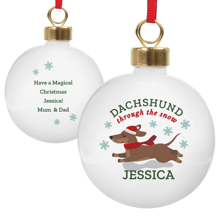 Buy Personalised 'Dachshund Through The Snow' Christmas Tree Bauble available now at www.giftsfinder.co.uk