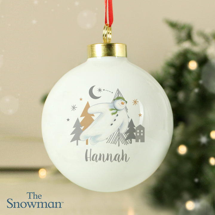 Personalised The Snowman Magical Adventure Bauble in gift category Personalised Christmas Decorations