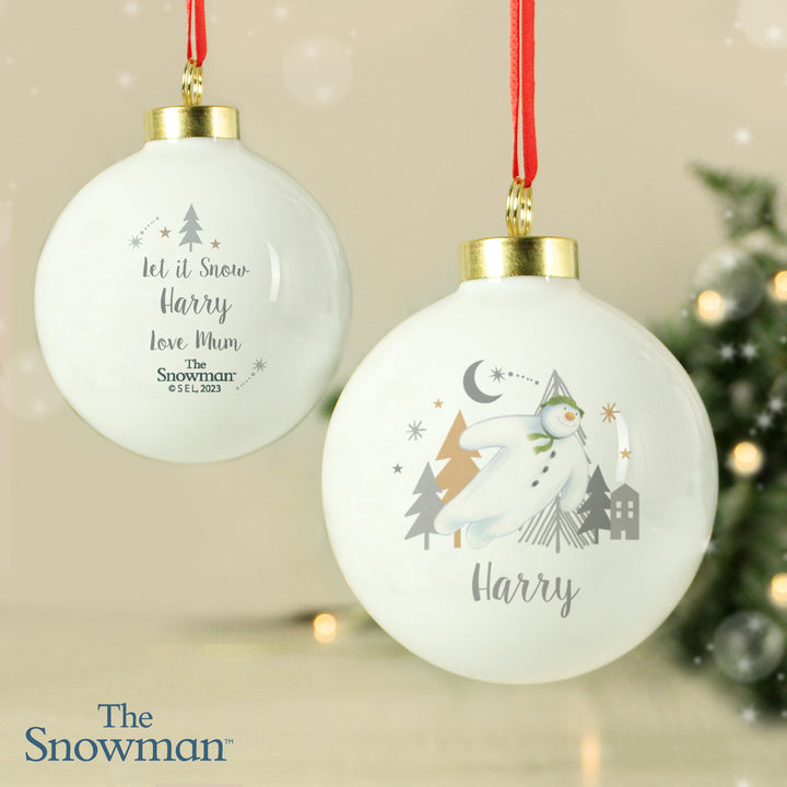 Personalised The Snowman Magical Adventure Bauble in gift category Personalised Christmas Decorations