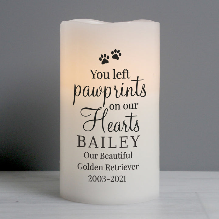 Buy Personalised Pawprints On Our Hearts LED Candle at www.giftsfinder.co.uk