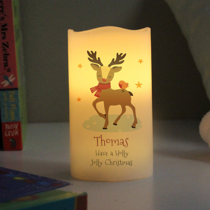 Buy Personalised Christmas Reindeer LED Candle available now at www.giftsfinder.co.uk