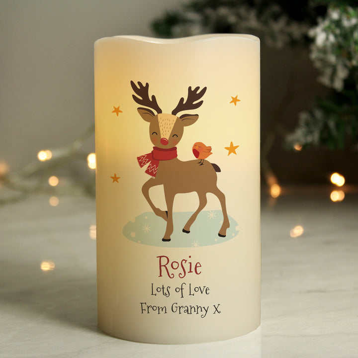 Buy Personalised Christmas Reindeer LED Candle available now at www.giftsfinder.co.uk