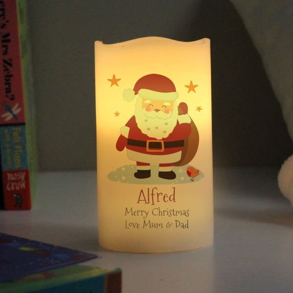 Buy Personalised Christmas Santa LED Candle available now at www.giftsfinder.co.uk