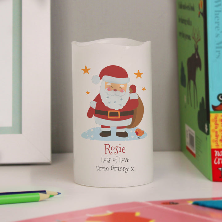 Buy Personalised Christmas Santa LED Candle available now at www.giftsfinder.co.uk