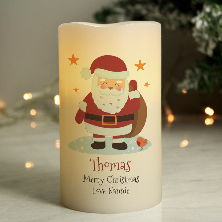 Buy Personalised Christmas Santa LED Candle available now at www.giftsfinder.co.uk