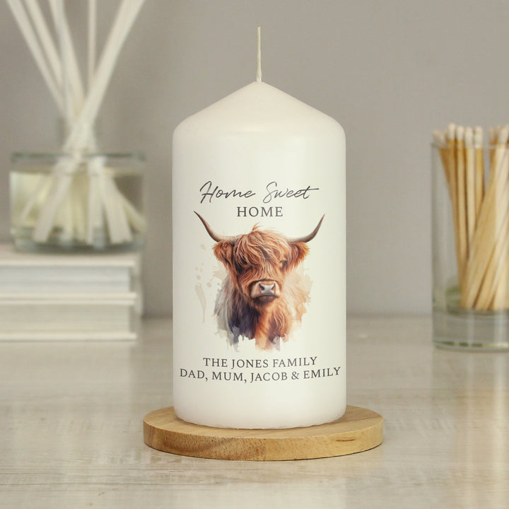 Buy Personalised Highland Cow Pillar Candle available now at www.giftsfinder.co.uk