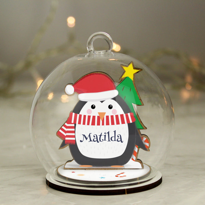 Personalised Wooden Penguin Glass Bauble in gift category Personalised Glass Baubles