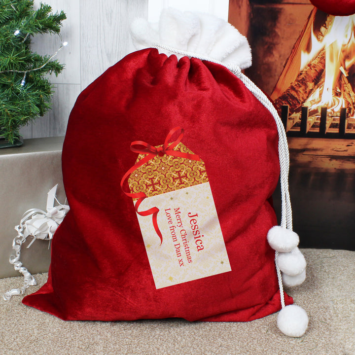 Buy Personalised Gift Tag Luxury Pom Pom Red Children's Christmas Sack at www.giftsfinder.co.uk