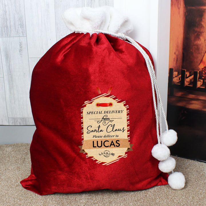 Buy Personalised Special Delivery Luxury Pom Pom Red Children's Christmas Sack at www.giftsfinder.co.uk