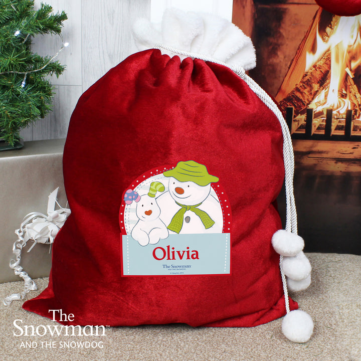 Buy Personalised The Snowman and the Snowdog Luxury Pom Pom Children's Christmas Sack at www.giftsfinder.co.uk