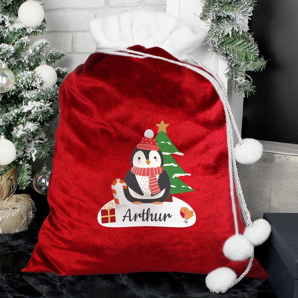 Buy Personalised Christmas Penguin Luxury Pom Pom Red Children's Christmas Sack available now at www.giftsfinder.co.uk