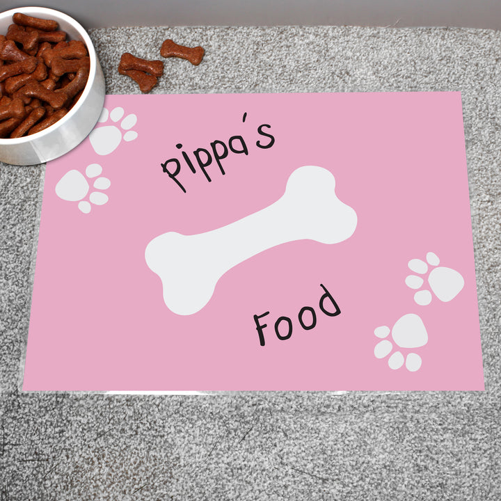 Buy Personalised Pink Paw Print Dog Placemat at www.giftsfinder.co.uk