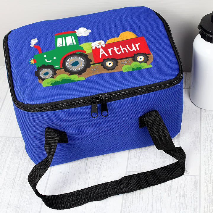 Buy Personalised Tractor Blue Lunch Bag at www.giftsfinder.co.uk